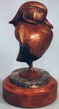 Bronze Bust of Woodduck on a Walnut Turn-Table Base with inlaid Jade Marble.

Limited edition of 25

$900