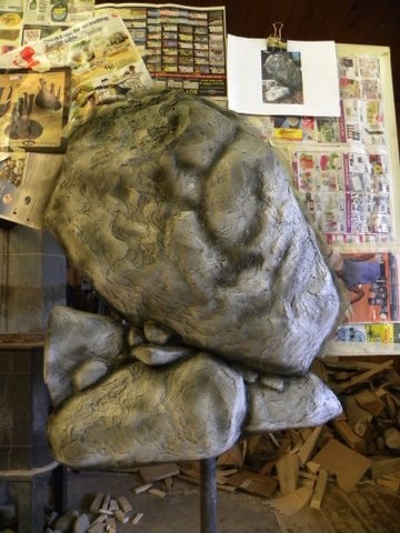 After the rocks are created, then I start sculpting with paint.